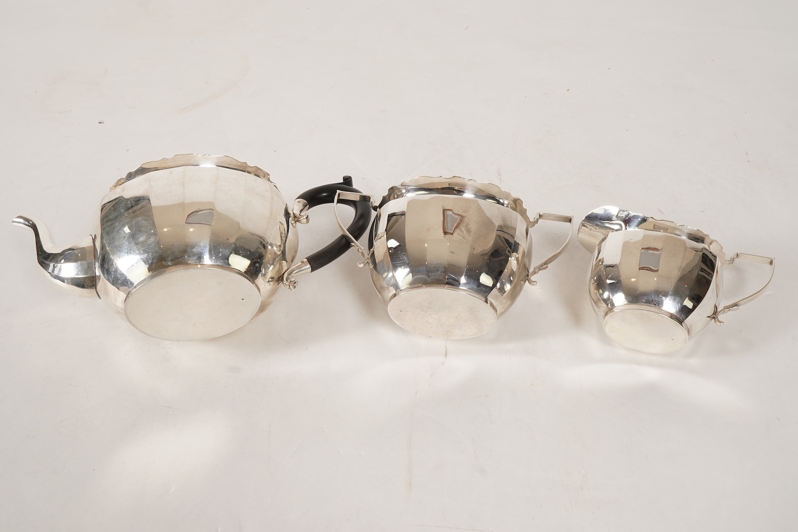 A George V silver three piece tea set by William Devonport